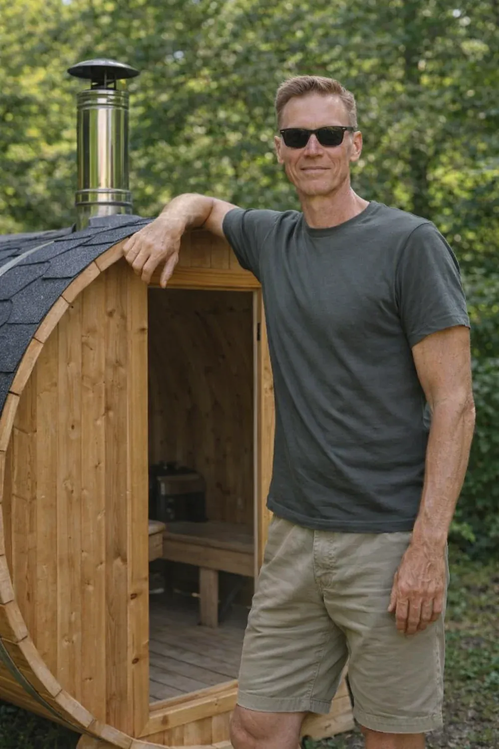 Petri, founder of RecoSauna, standing beside an outdoor sauna